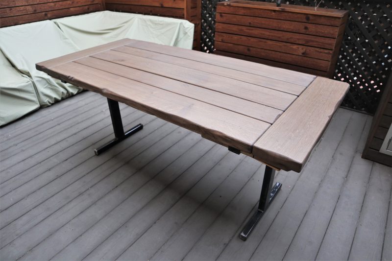 Outdoor table with metal base